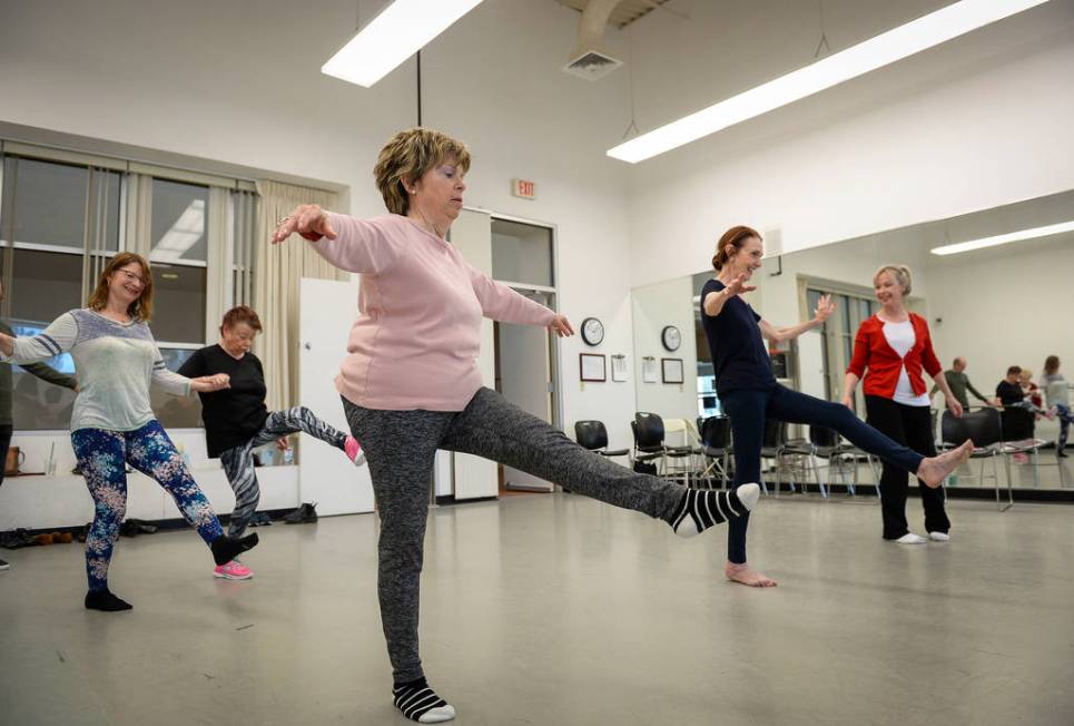 People participate in a ballet class for individuals with Parkinson's disease lead by Pamela La ...