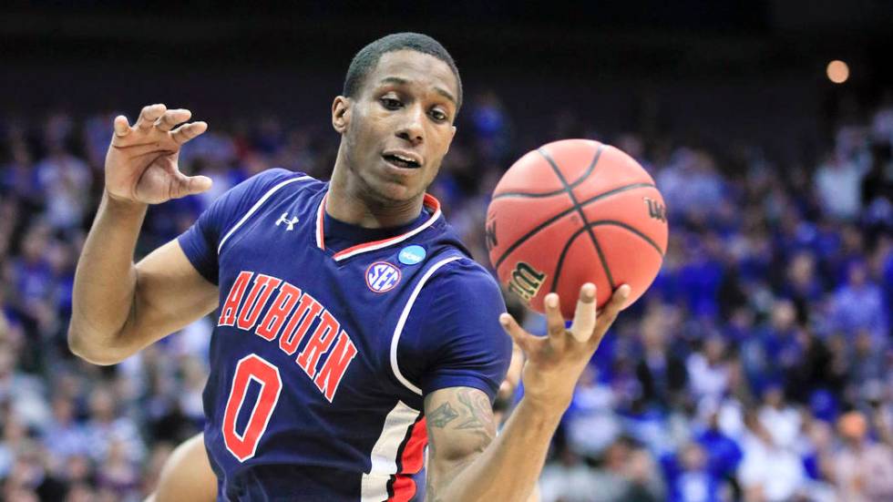 Auburn forward Horace Spencer plays against Kentucky during the first half of the Midwest Regio ...