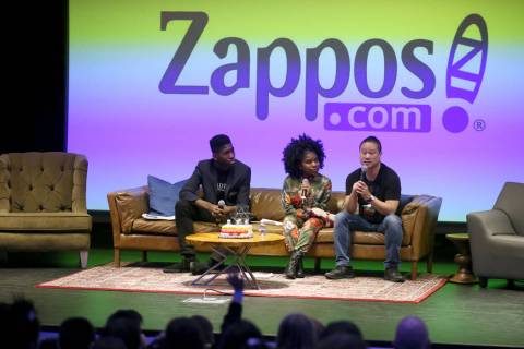Zappos CEO Tony Hsieh, right, takes questions with Meahel Heard-Pitra, left, and Trinitee Stoke ...
