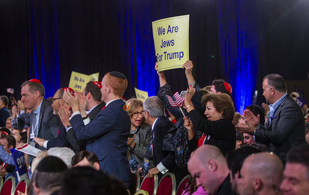 Attendees cheer for a speech as they await President Donald J. Trump to address the Republican ...