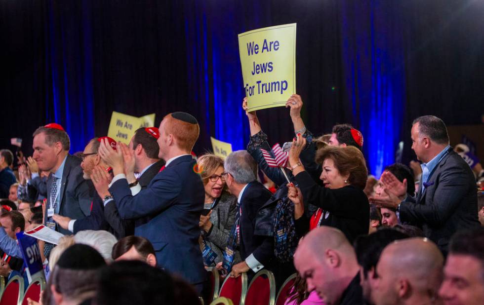 Attendees cheer for a speech as they await President Donald J. Trump to address the Republican ...