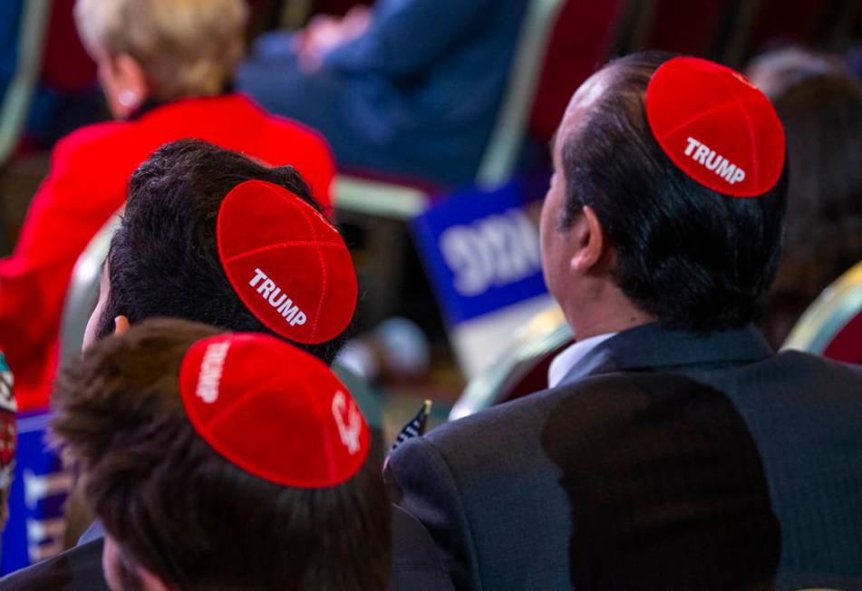 Attendees wear Trump yamakas as they await President Donald J. Trump to address the Republican ...