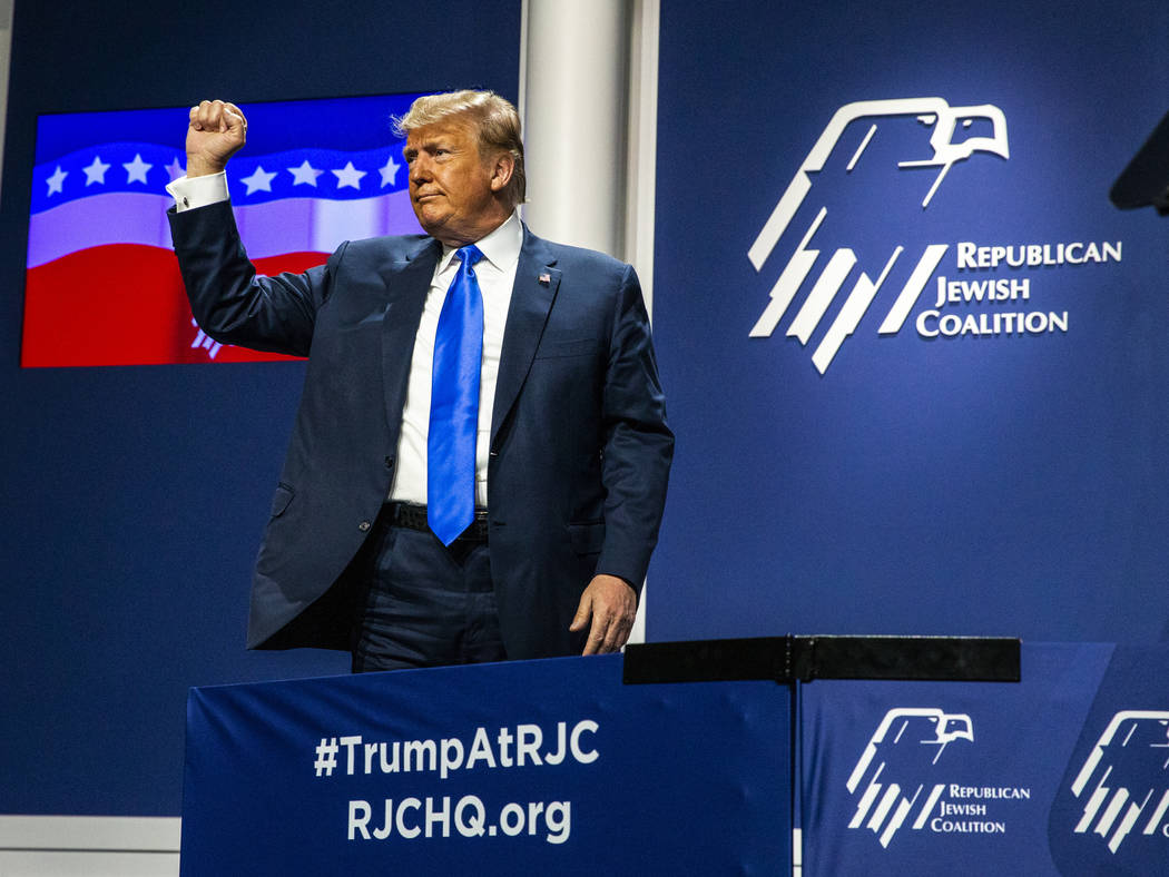 President Donald J. Trump thanks the crowd after addressing the Republican Jewish Coalition dur ...