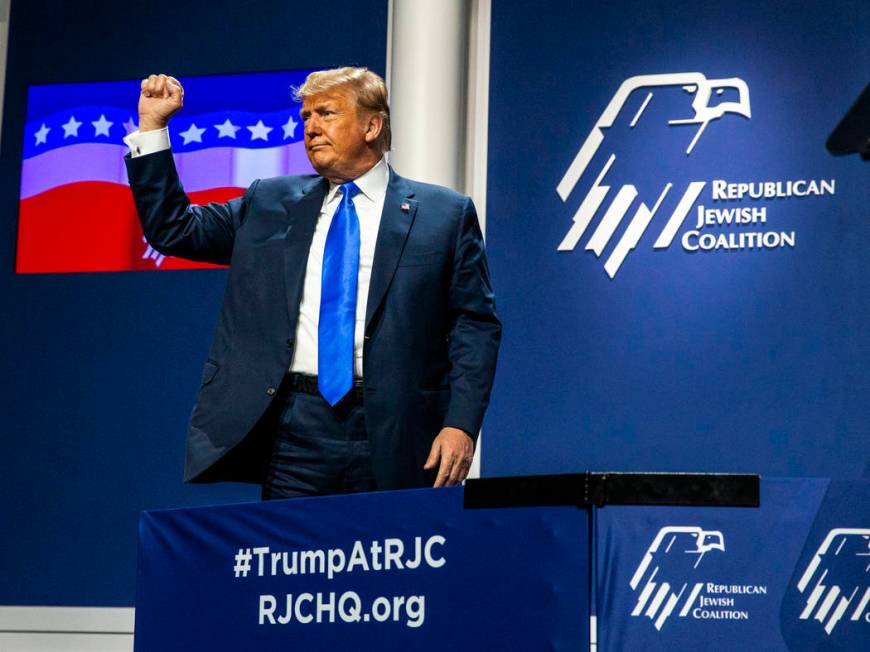 President Donald J. Trump thanks the crowd after addressing the Republican Jewish Coalition dur ...