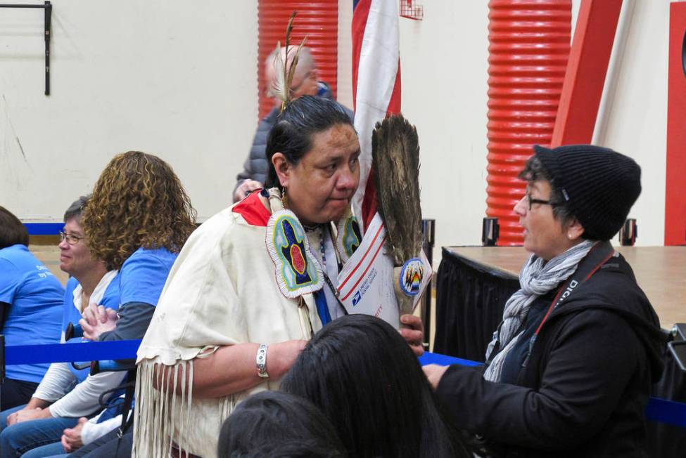 Joann Spotted Bear, a member of the Lakota Tribe, talks to a journalist before Sen. Elizabeth W ...