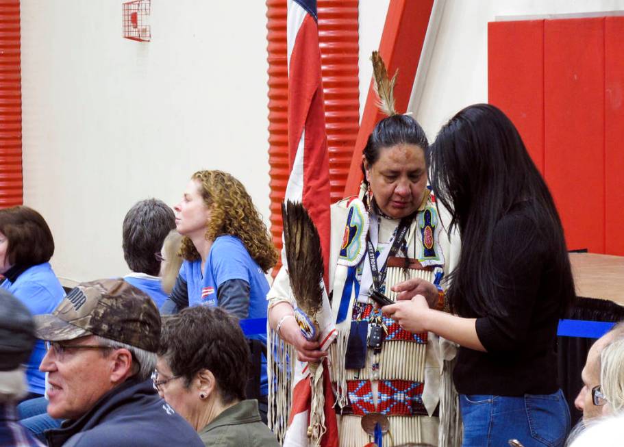 Joann Spotted Bear, a member of the Lakota Tribe, talks to a journalist before Sen. Elizabeth W ...