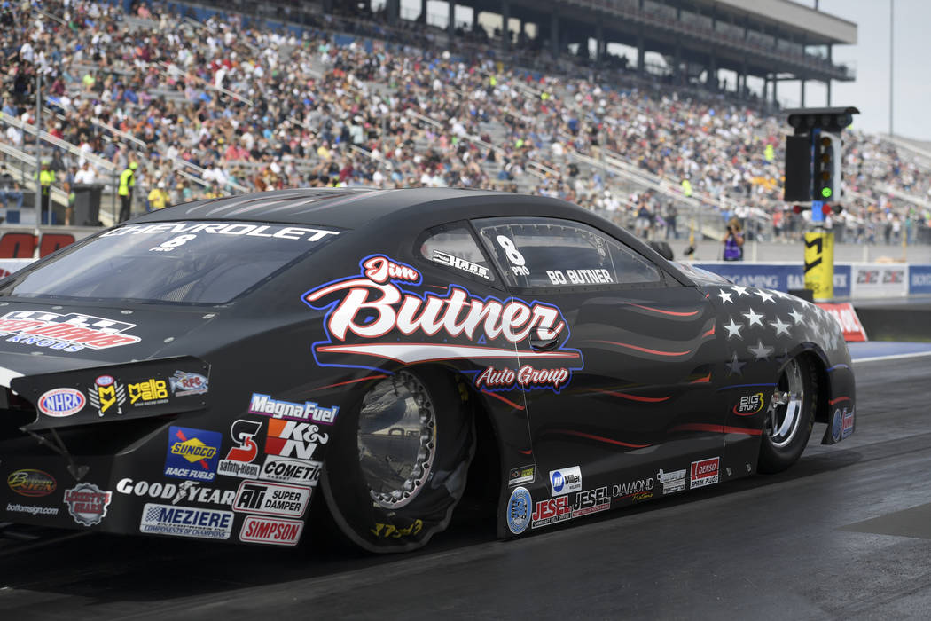 In this photo provided by the NHRA, Bo Butner secures his second No. 1 qualifier of the season ...