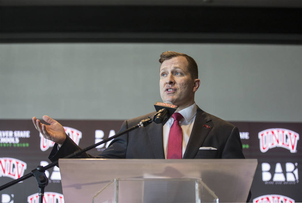 New UNLV men's basketball coach T.J. Otzelberger addresses the crowd at the Strip View Pavilion ...