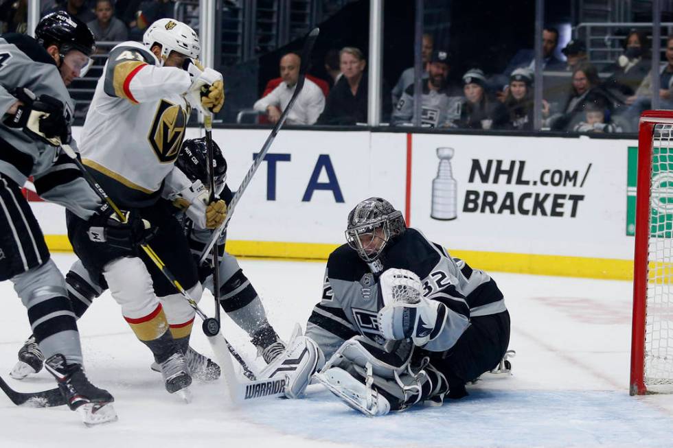 Los Angeles Kings goalie Jonathan Quick (32) stops a shot by Vegas Golden Knights forward Pierr ...