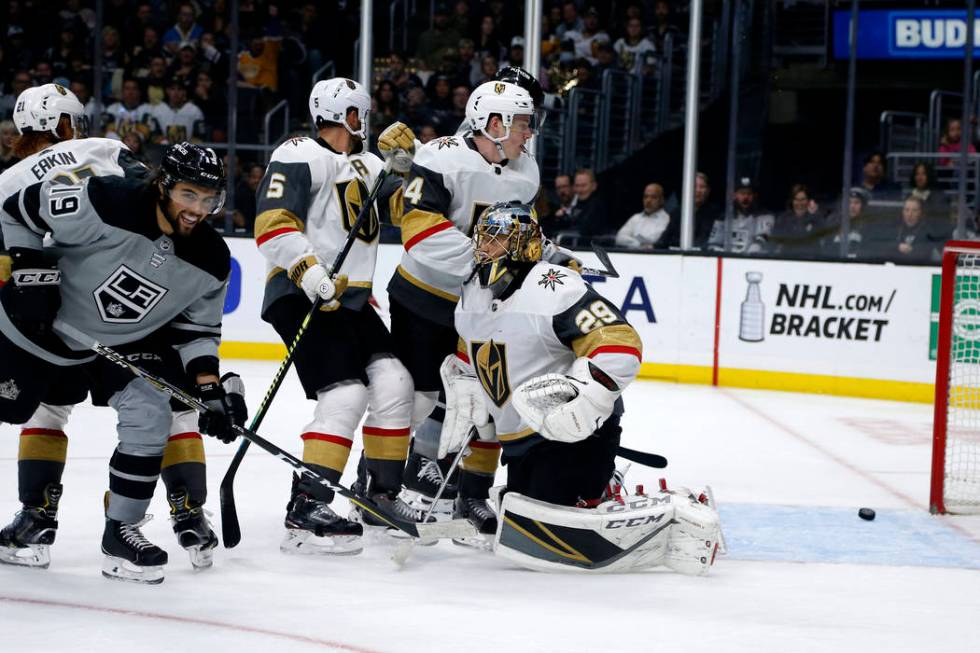 Los Angeles Kings forward Alex Iafallo (19) celebrates after a goal by forward Matt Roy during ...