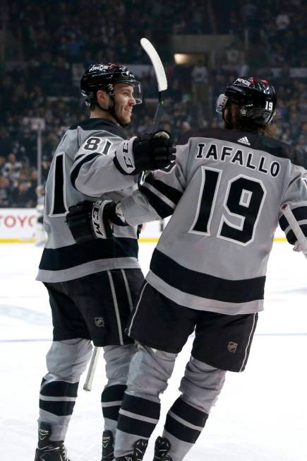 Los Angeles Kings forward Matt Roy (81) celebrates his goal with forward Alex Iafallo (19) duri ...