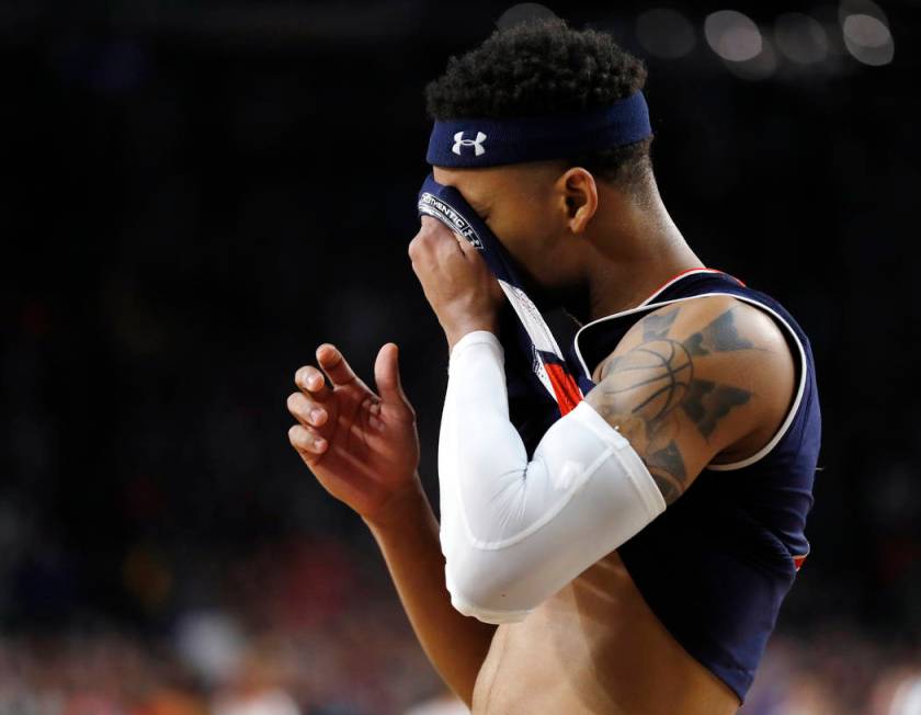 Auburn guard Bryce Brown reacts at the end of a semifinal round game against Virginia in the Fi ...