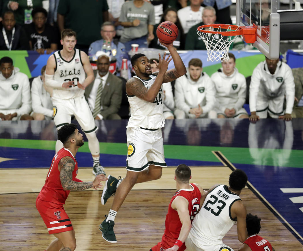 Michigan State's Nick Ward (44) takes a shot during the second half in the semifinals of the Fi ...