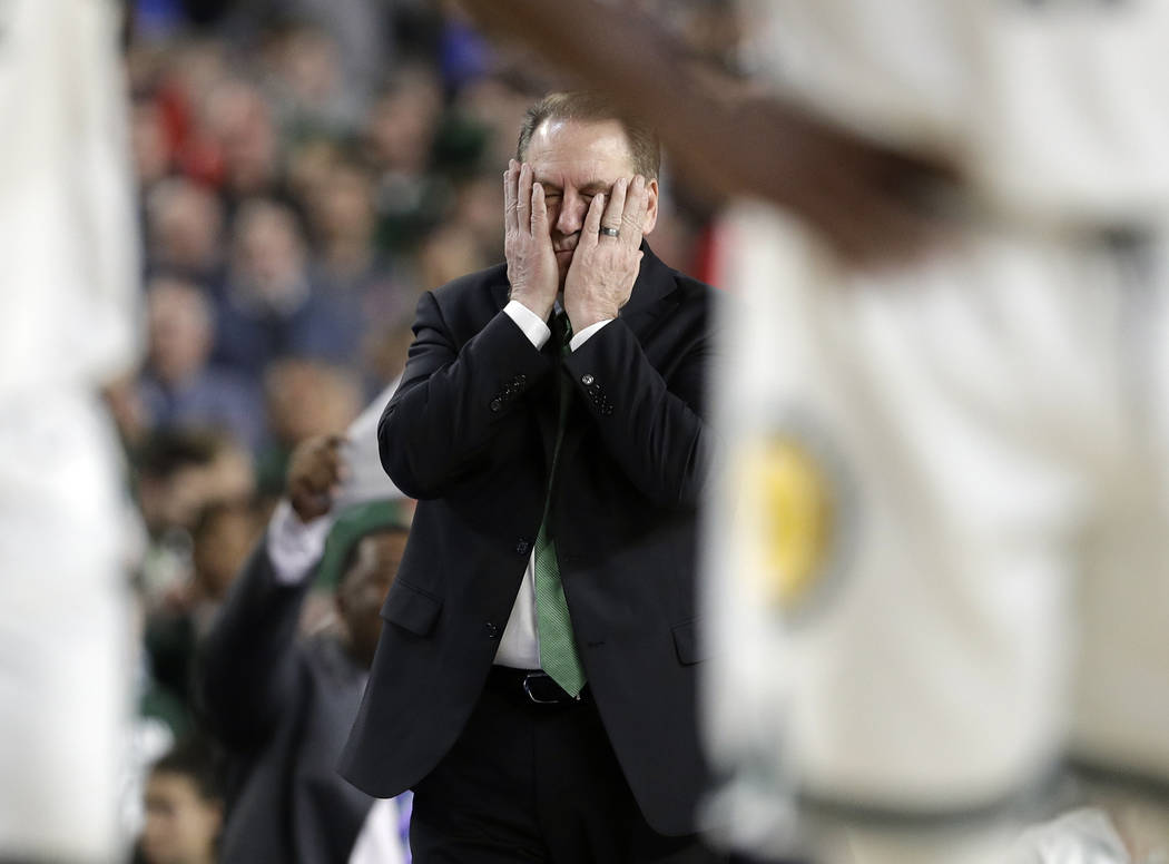 Michigan State head coach Tom Izzo reacts during the second half in the semifinals of the Final ...