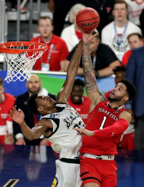 Texas Tech's Brandone Francis (1) shoots over Michigan State's Xavier Tillman (23) during the s ...