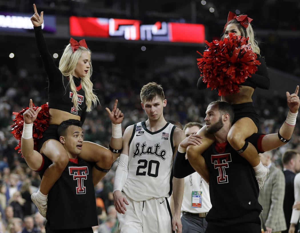 Michigan State's Matt McQuaid (20) leaves the court after the team's 61-51 loss to Texas Tech i ...