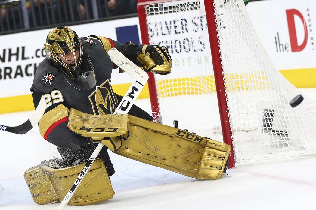 Golden Knights goaltender Marc-Andre Fleury (29) blocks a shot from the Arizona Coyotes during ...