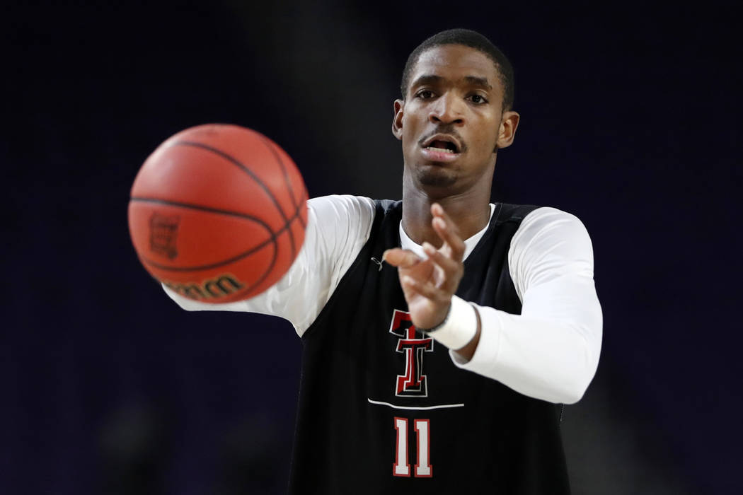 Texas Tech's Tariq Owens (11) warms up during a practice session for the semifinals of the Fina ...