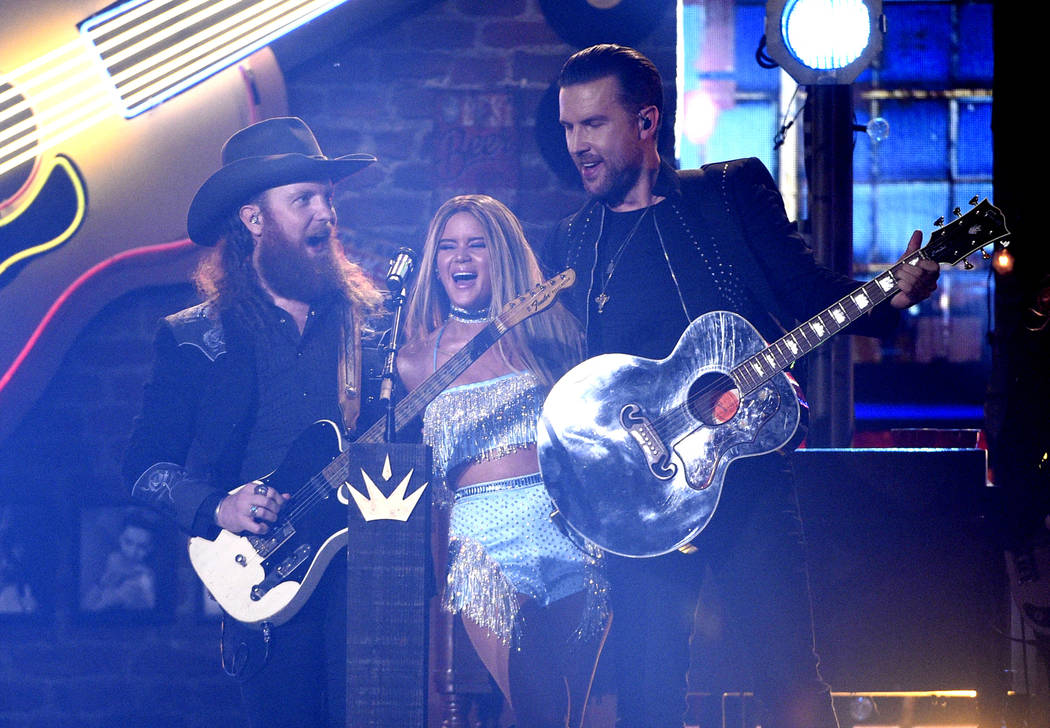 John Osborne, left, and T.J. Osborne, right, of Brothers Osborne, and Maren Morris perform &quo ...