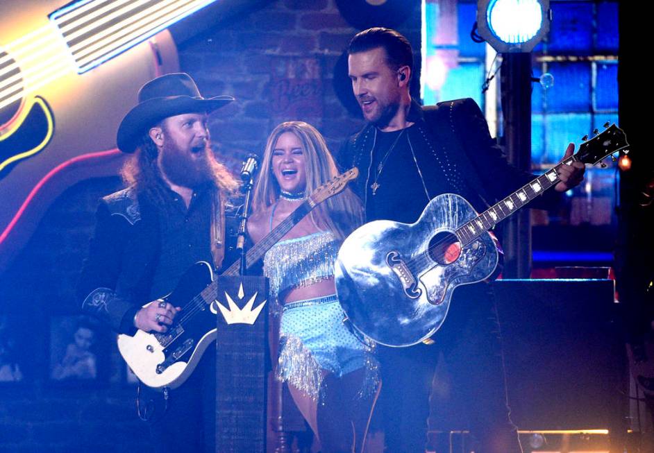 John Osborne, left, and T.J. Osborne, right, of Brothers Osborne, and Maren Morris perform &quo ...