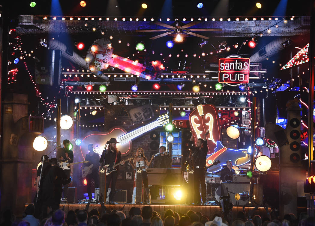 John Osborne, left, and T.J. Osborne, right, of Brothers Osborne, and Maren Morris perform &quo ...