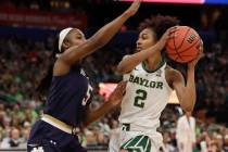 Baylor guard DiDi Richards (2) looks to pass the ball as Notre Dame guard Jackie Young (5) defe ...