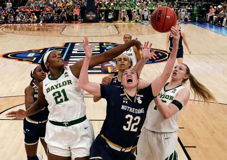 Baylor's Kalani Brown (21) blocks a shot attempt by Notre Dame's Jessica Shepard (32) during th ...