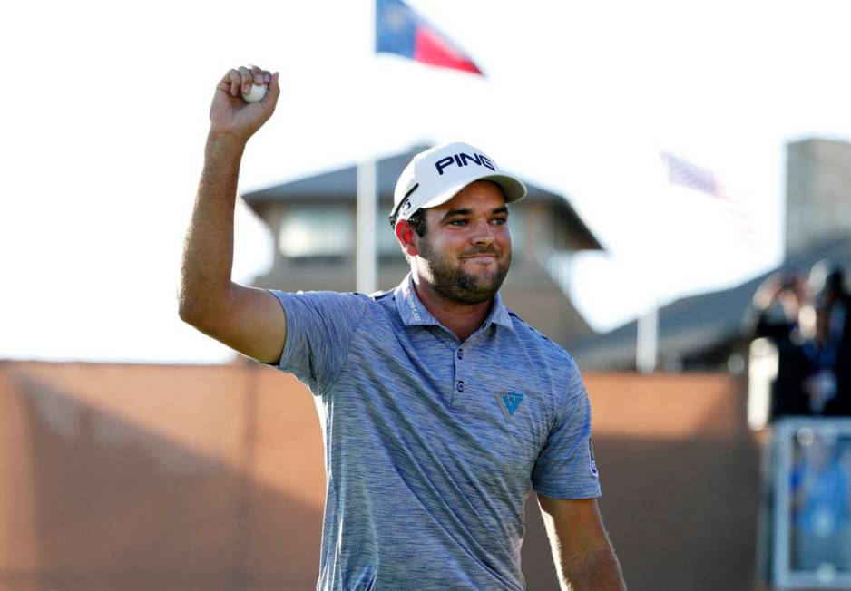 Corey Conners celebrates after sinking a putt on the 18th hole to win the Texas Open golf tourn ...