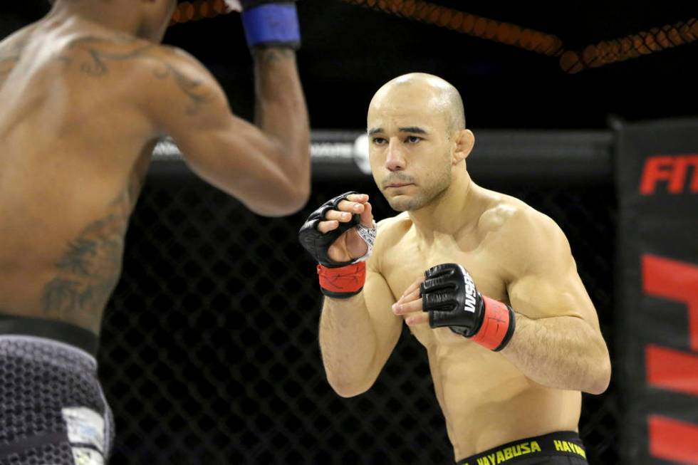 Marlon Moraes in action against Josinaldo Silva during their WSOF bantamweight title fight at t ...