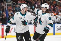 San Jose Sharks' Melker Karlsson (68) and Erik Karlsson (65), celebrate a goal against the Edmo ...