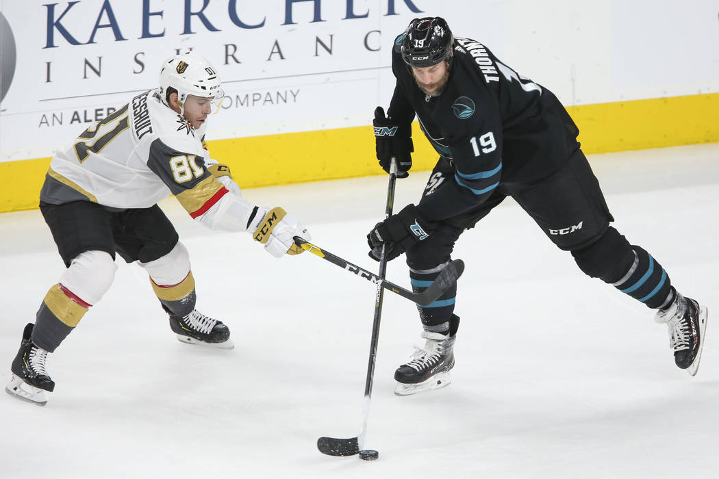 Vegas Golden Knights center Jonathan Marchessault (81) defends against San Jose Sharks center J ...