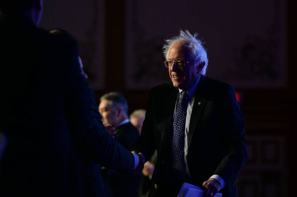 Democratic presidential candidate Sen. Bernie Sanders, I-Vt., greets people on stage before spe ...