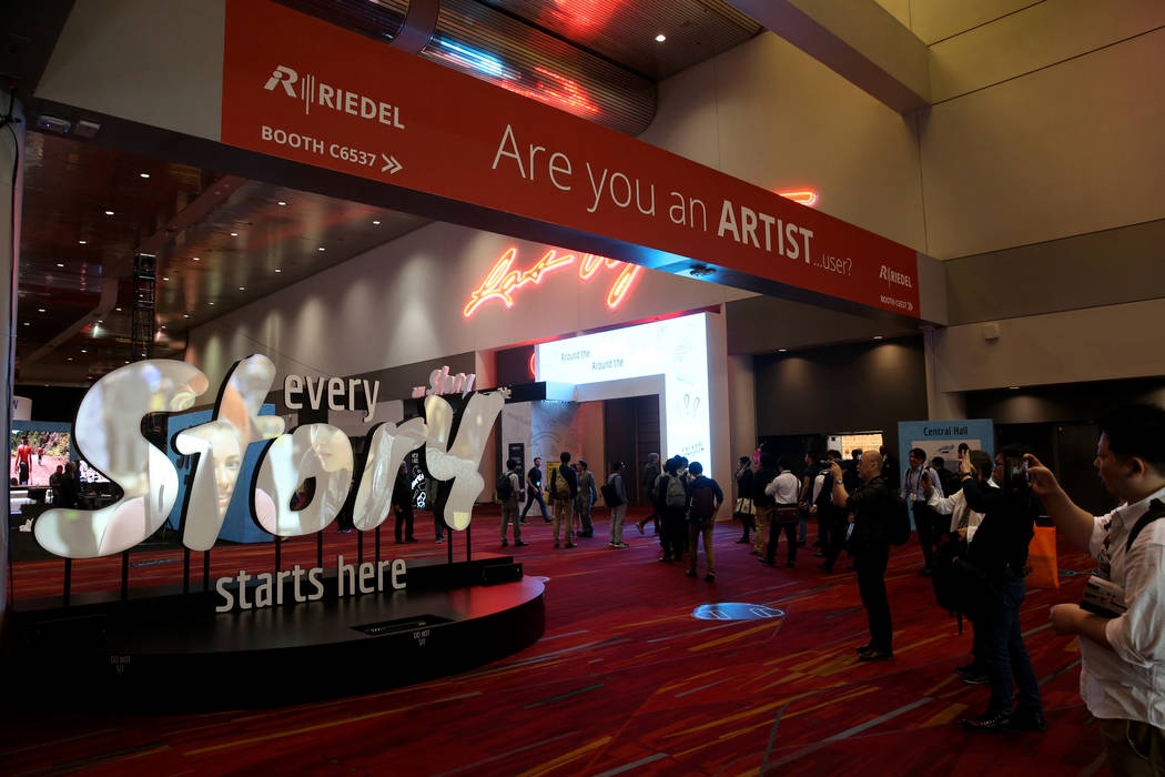 Conventioneers arrive on the opening day of the National Association of Broadcasters Show at th ...