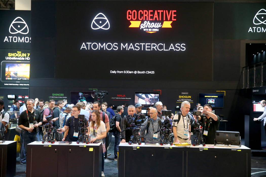 Conventioneers can check out camera monitors at the Atomos booth on the opening day of the Nati ...