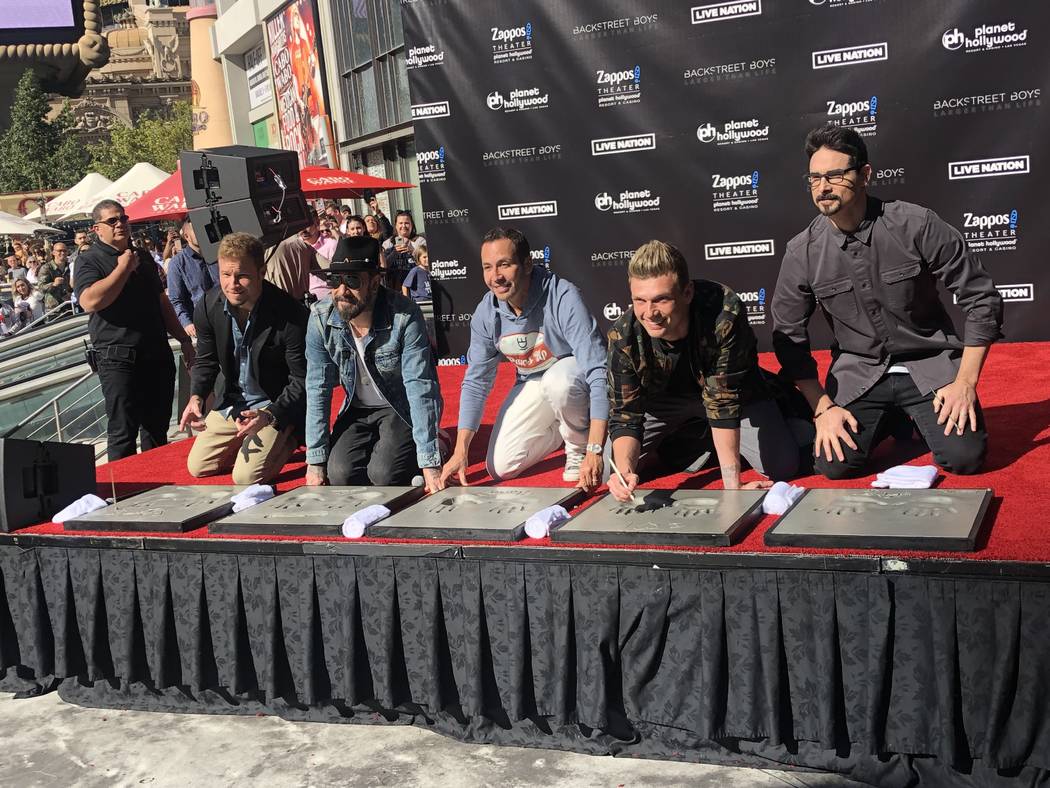 The Backstreet Boys are shown during their hand-print ceremony at Planet Hollywood on Friday, A ...