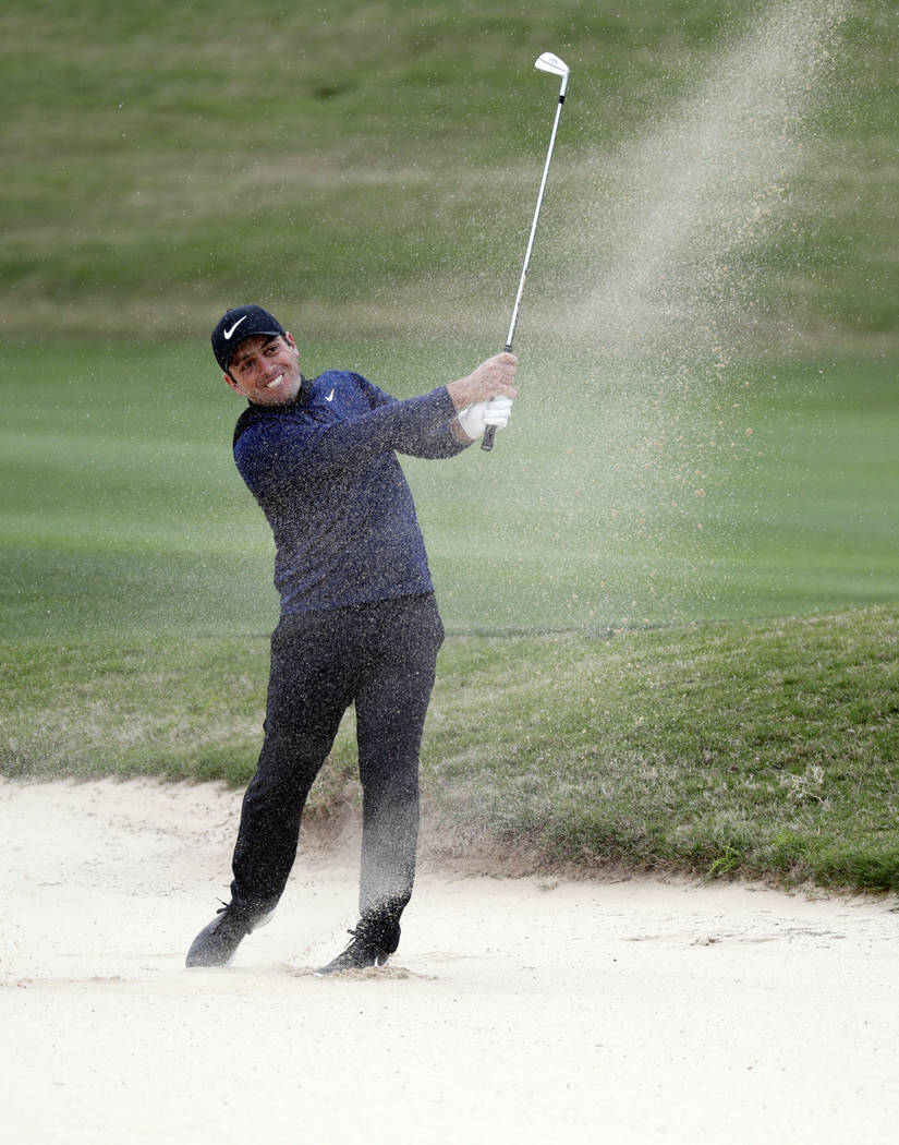 Francesco Molinari plays a shot from a bunker on the 15th hole during semifinal play against Ke ...