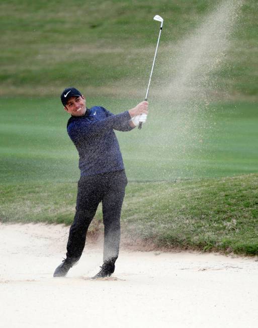 Francesco Molinari plays a shot from a bunker on the 15th hole during semifinal play against Ke ...