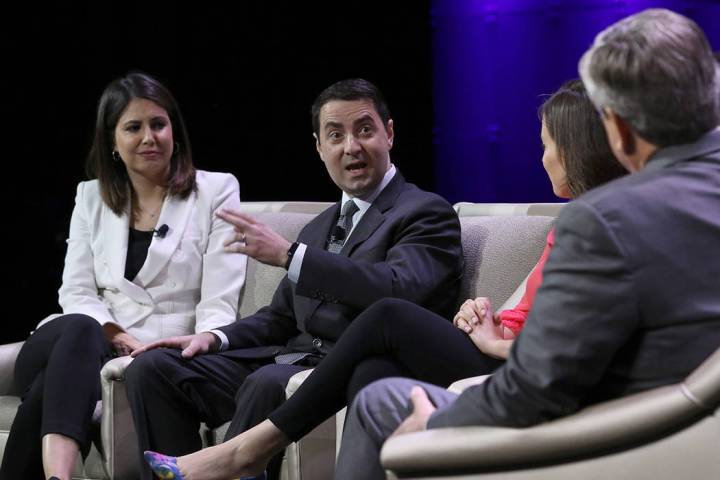 Steven Portnoy, second left, White House Correspondent at CBS, speaks during a panel discussion ...