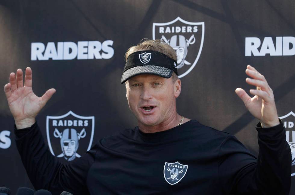 Oakland Raiders head coach Jon Gruden speaks to reporters at the team's football facility in Al ...