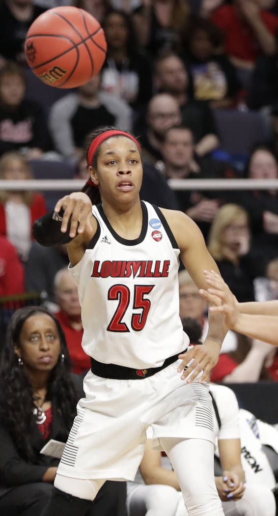 Louisville guard Asia Durr (25) passes during the second half of a regional semifinal game agai ...