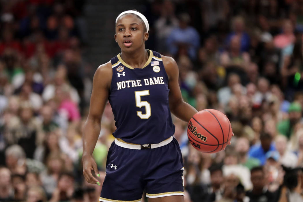 Notre Dame guard Jackie Young (5) dribbles the ball, during the second half of the Final Four c ...