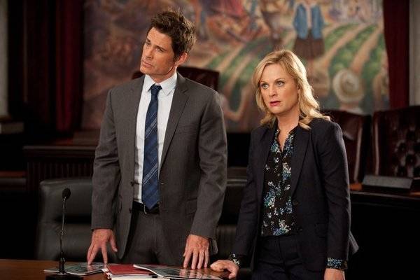 Rob Lowe as Chris Traeger and Amy Poehler as Leslie Knope in "Parks and Recreation." (Colleen H ...