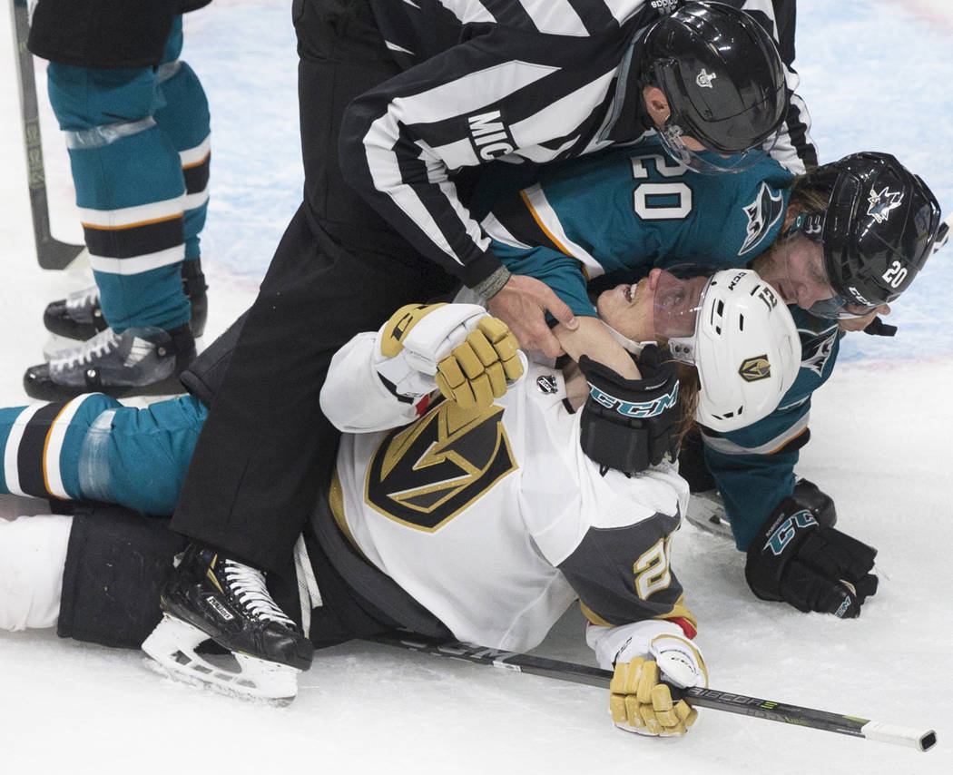 Golden Knights center Cody Eakin (21) gets in a fight with San Jose Sharks left wing Marcus Sor ...