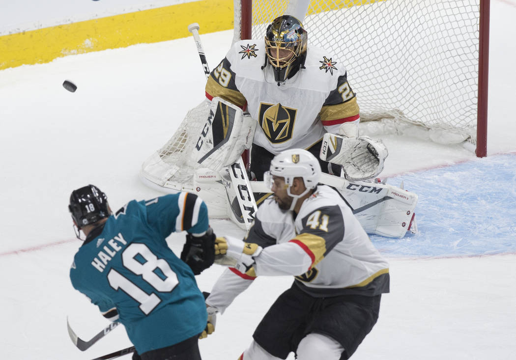 Golden Knights goaltender Marc-Andre Fleury (29) makes a save against San Jose Sharks center Mi ...