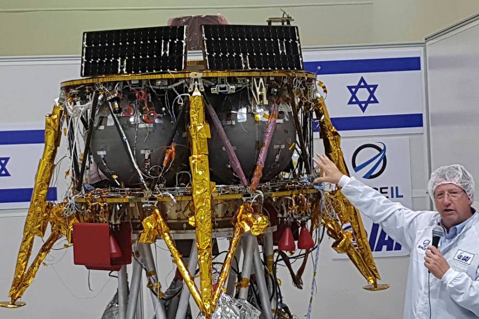 Opher Doron, general manager of Israel Aerospace Industries' space division, speaks beside the ...