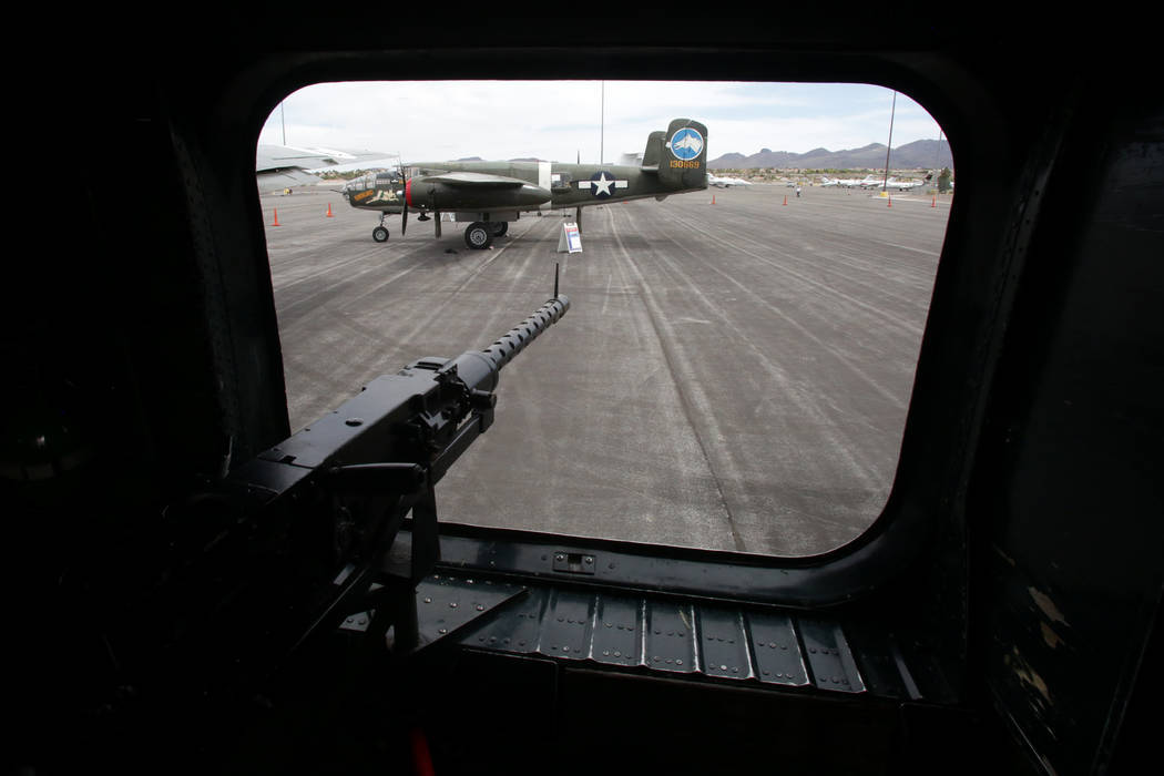 The view from a waist gunner’s 50-caliber machinegun in a B-24J Liberator looks out at t ...