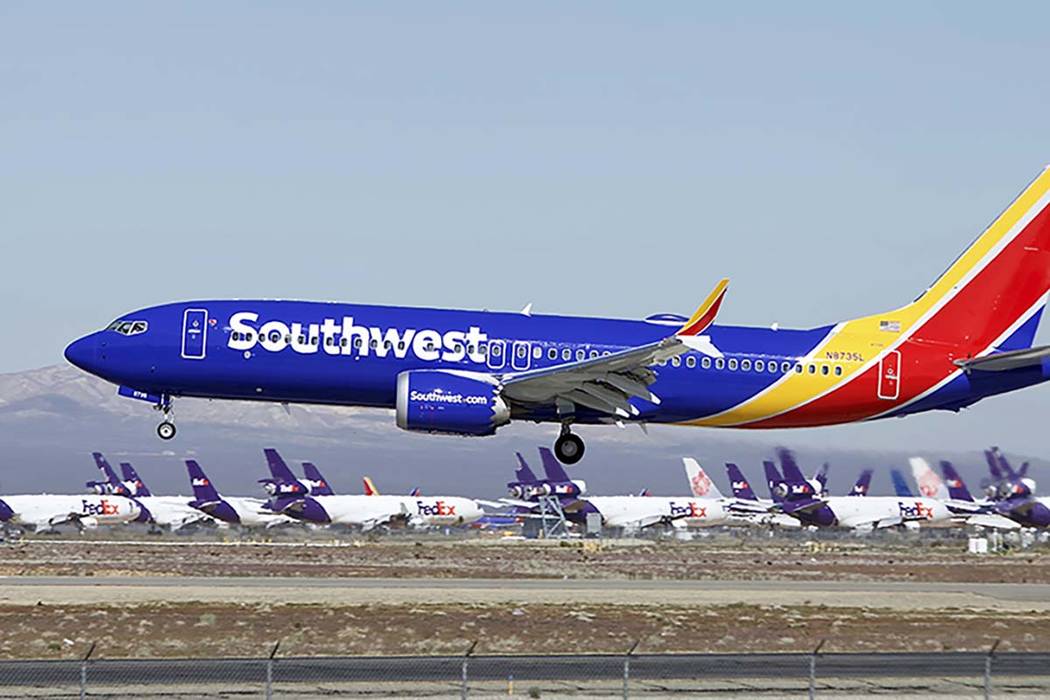 A Southwest Airlines Boeing 737 Max aircraft lands at Victorville, Calif., on March 23, 2019. S ...