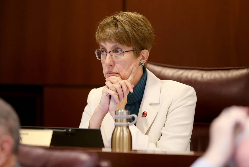 Assemblywoman Heidi Swank, D-Las Vegas, listens to a presentation during a Ways and Means Commi ...