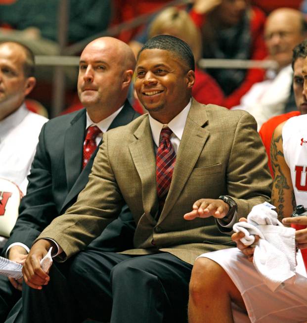 Assistant coach DeMarlo Slocum as the University of Utah men's basketball team defeats Simon Fr ...