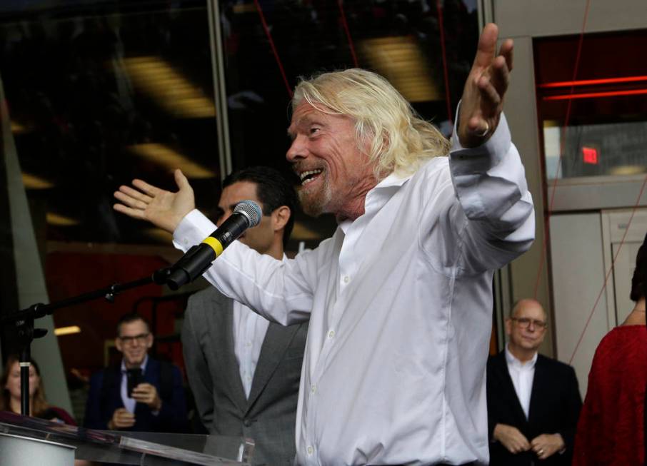 Richard Branson, of Virgin Group, speaks during a naming ceremony for the Brightline train stat ...